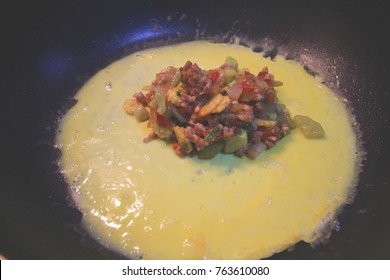 Stuffed Omelet Thaifoods  Eeg And Mix Vegetable  Baby Corn,tomato,cucumber,onion, Coriander On Top
