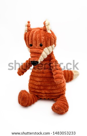 Stuffed plush toy in the shape of a fox