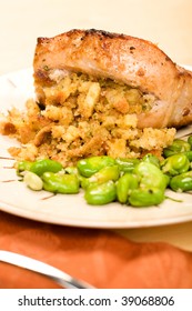 Stuffed Pork Chop Served With Fava Beans