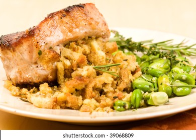 Stuffed Pork Chop Served With Fava Beans