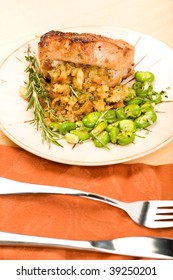 Stuffed Pork Chop Served With Fava Beans