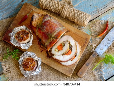 Stuffed Pork Loin Roast With Baked Garlic