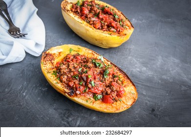 Stuffed Spaghetti Squash With Ground Beef Tomatoes And Seasoning. Topped With Parsley