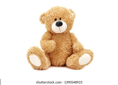 stuffed teddy bear sitting coffee