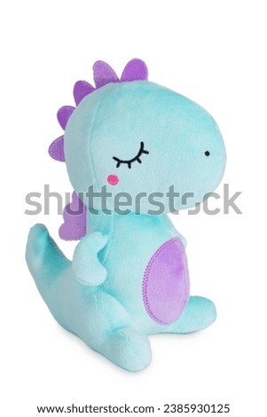 a stuffed toy in the form of a dragon, the symbol of 2024, isolated on a white background