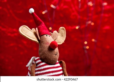 A Stuffed Toy Of Rudolf The Red Nosed Reindeer.