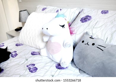 Stuffed Unicorn On Bed In Bedroom, Fun Young Girl