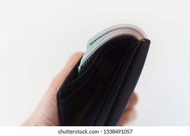 Stuffed Wallet In His Hand