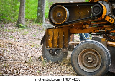 A Stump Grinding  Machine Removing A Stump From Cut Down Tree