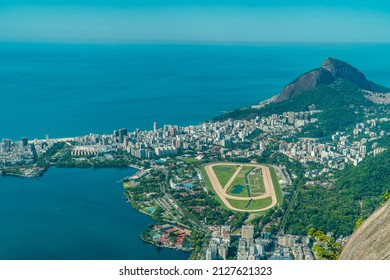 Stunning aerial panoramic view of Rio de Janeiro, Brazil with Leblon neighborhood and Formula One track seen from Christ the Redeemer