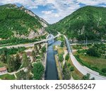 Stunning aerial shot of the Ovcar Kablar Gorge in Serbia, showcasing the winding river and rugged landscape, perfect for nature lovers and hikers.