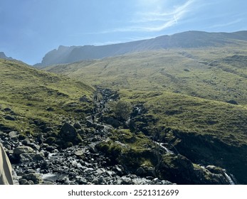 Stunning aerial view of the Lake District National Park in England, showcasing a breathtaking landscape of serene lakes, lush green hills, and dramatic mountain peaks.  - Powered by Shutterstock