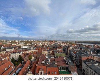 A stunning aerial view of Toruń Old Town, Poland, highlighting its iconic Gothic architecture, red roofs, and historic charm. - Powered by Shutterstock