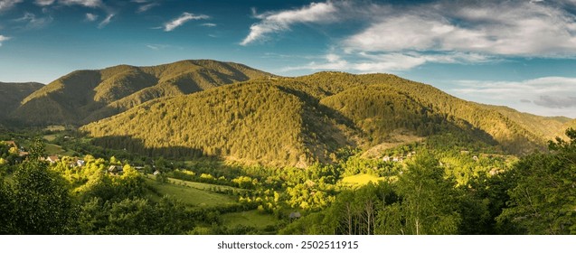 A stunning aerial view of Tara park in Serbia, showcasing its lush green mountains, dense forests, and scenic valleys - Powered by Shutterstock