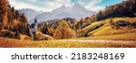 Stunning Autumn landscape. Scenic view on Maria Gern church with mountains on background. Vivid atmospheric nature scenery. Natural background. Iconic location for landscape photographers.
Formats