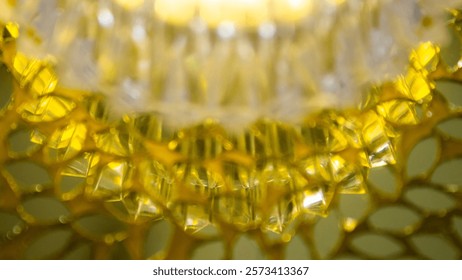 Stunning background texture image made with a clusters of oval shaped mirror shards with a diamond shaped glass element placed over it
