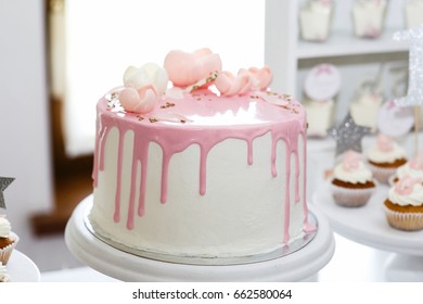 Stunning Birthday Cake Covered With Pink Icing And Roses