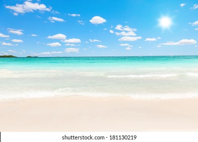 Stunning Caribbean Beach Of Transparent Water Against The Sun