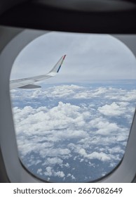 Stunning cloudscape view from airplane window.