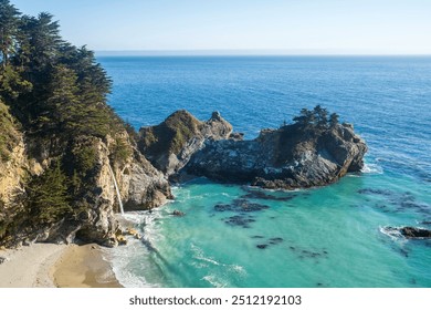 A stunning coastal view featuring cliffs, turquoise waters, a hidden waterfall, and lush greenery under a clear blue sky - Powered by Shutterstock