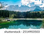 Stunning Dolomites mountain range in northeastern part of Italy with amazing lake with reflections in the water.