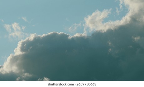 A Stunning and Dramatic Cloud Formation in an Expansive Blue Sky Above the Horizon