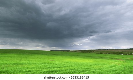 A Stunning Dramatic Cloudy Sky Over Beautiful Lush Green Fields and Agriculture Landscapes Time lapse.