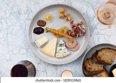 Stunning Food Board Is Presented With Wine. The Board Is Presented Beautifully And Serves To Compliment The Wine. 