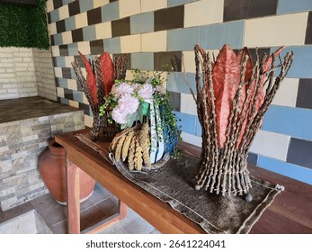 Stunning home decor featuring handcrafted twig lamps and a vibrant flower bouquet. Perfect for interior design inspiration, showcasing artisan crafts and unique home styling.