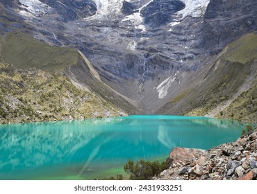 Stunning images of Laguna Humantay, the pristine glacial lake set against the majestic Andes in Peru. Ideal for projects that capture the intact beauty of nature and Andean landscapes - Powered by Shutterstock