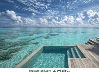 A stunning infinity pool seamlessly blends with the vast turquoise ocean, under a dramatic sky filled with fluffy white clouds.