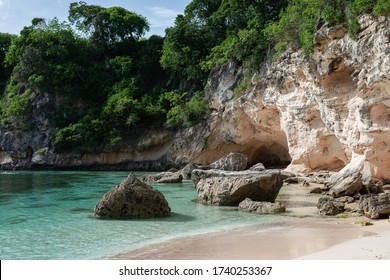 
Stunning landscape on the beach of Mokao. Blue lagoon on a cliff background. Large stones in turquoise water. White sand