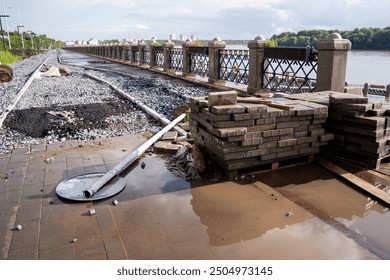 A stunning and magnificent bridge is currently under construction by a peaceful and calm body of water, showcasing the beautiful blend of nature alongside modern engineering techniques and designs - Powered by Shutterstock