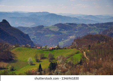 Stunning mountain scenery in spring in Europe with many green hills and trees - Shutterstock ID 1346961830