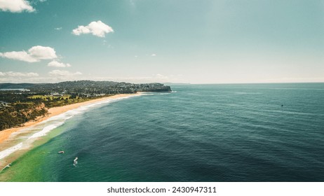 Stunning ocean view of the waves and beach in the Northern Beaches of NSW, Sydney, Australia. The view was captured from above using a drone. - Powered by Shutterstock - Get 15% off with code: PIKWIZARD15