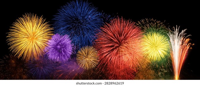 A stunning panorama of colorful fireworks exploding in the dark night sky, creating a festive and celebratory atmosphere.
