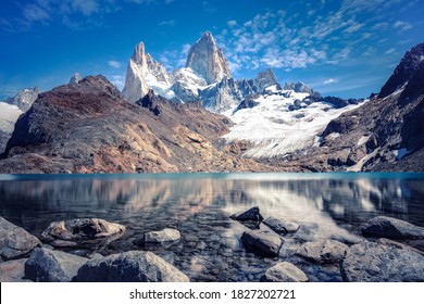 Stunning panoramic view from the lagoon of Los Tres towards Mount Fitz Roy and Cerro Torre in Los Glaciares National Park near El Chalten, Argentina