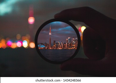 A stunning photo of a filter with the Toronto skyline in it