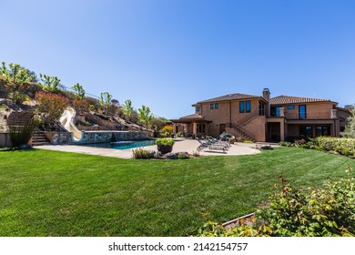 Stunning Pool with Waterfall and Water Slide, and Backyard Area of a 75 Acre, Sonoma Wine Country Estate, Horse Property