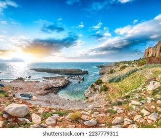 Stunning seascape of Isolidda Beach near San Vito cape. Popular travel destination of Monte Cofano National Park. Location: San Vito Lo Capo, Province of Trapani, Sicily, Italy, Europe - Shutterstock ID 2237779311