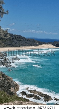Similar – Image, Stock Photo A serene beachscape at Lariño with seagulls flying over gentle waves under a clear blue sky, reflecting tranquility and the beauty of Galicia