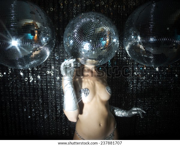 stunning\
sexy disco woman with a mirror ball for a\
head