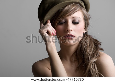 Stunning Shot of a Fashion Model in Old Military Hat