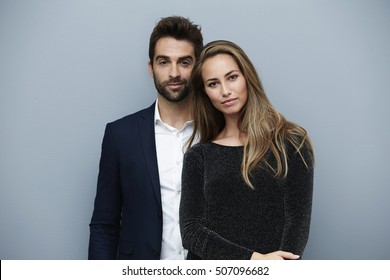 Stunning smartly dressed couple, portrait
