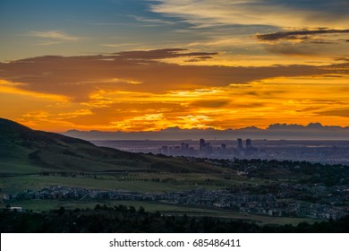 A stunning sunrise over Denver, as seen from Red Rocks Amphitheatre in Morrison, Colorado.