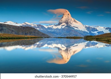 Stunning sunrise panorama with Matterhorn and beautiful alpine lake,Stellisee,Valais region,Switzerland,Europe