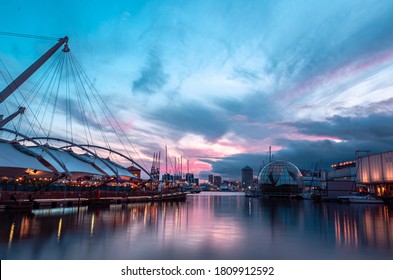 Stunning sunset in the ancient harbour of Genoa