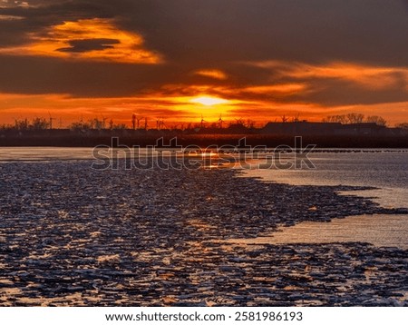 Image, Stock Photo Partly frozen lake with a view of the snow-covered fir forest
