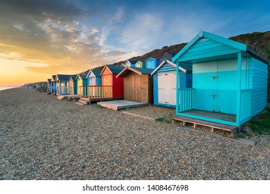 Stunning Sunset Over A Row Of Brightly Coloured Beach Huts At Milford On Sea On The Hampshire Coast