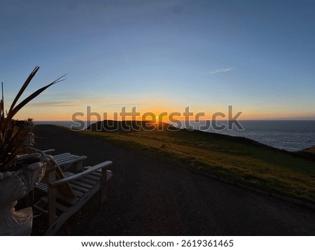 Stunning sunset, peering out to sea from Camelot castle in Tintagel 